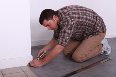 Man laying lino clipart