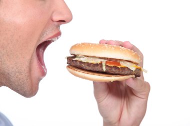 Man eating hamburger clipart