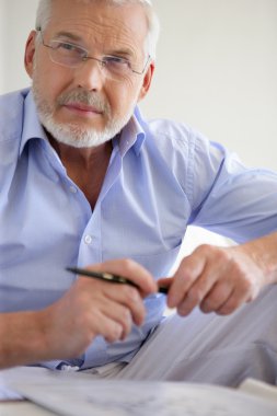 Pensive gray-haired man clipart