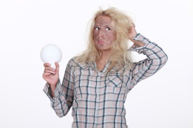 Young woman holding light-bulb clipart