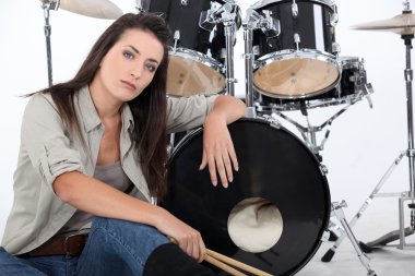 Woman posing with her drum set clipart