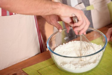 Whisking flour clipart