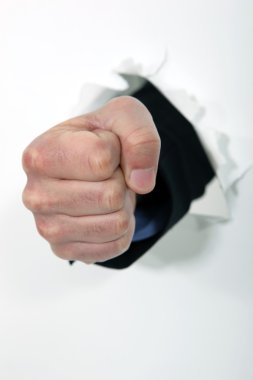 A fist punching through a wall clipart