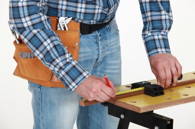 Craftsman taking measurements clipart