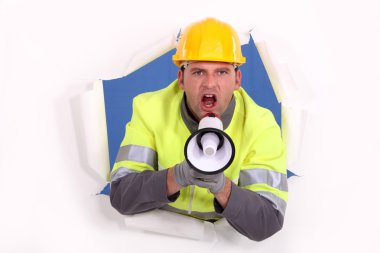 Road worker yelling in a megaphone clipart