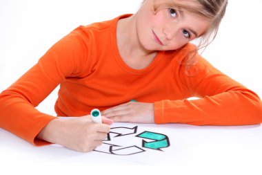 Girl colouring recycling sign clipart