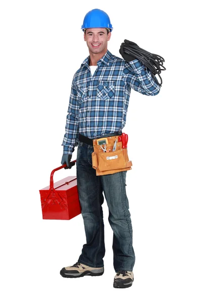 Hombre con caja de herramientas y cable — Foto de Stock