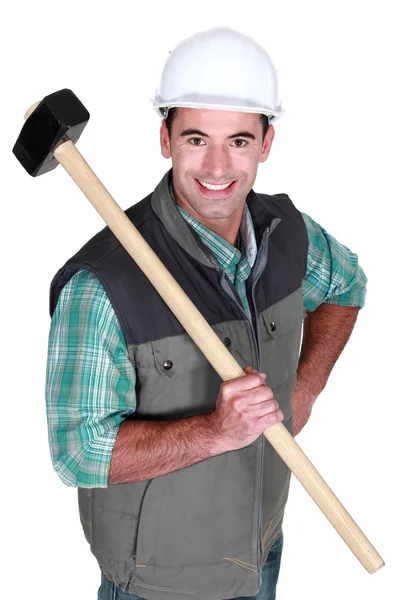 Cheerful worker with a sledgehammer — Stock Photo, Image