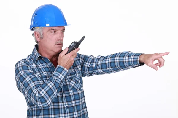 Foreman with radio pointing — Stock Photo, Image