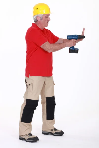 Construction worker with a drill — Stock Photo, Image