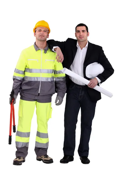 Geschäftsmann und Handwerker posieren gemeinsam — Stockfoto