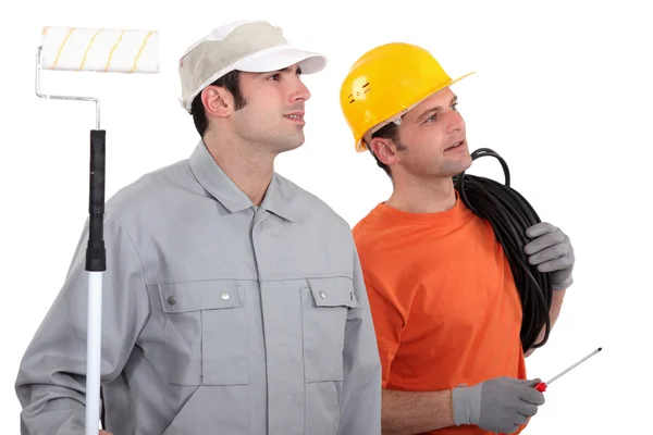 Electrician and decorator — Stock Photo, Image