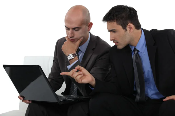 Two businessmen exchanging thoughts — Stock Photo, Image
