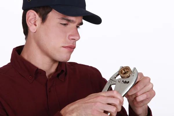 Man using a wrench — Stock Photo, Image