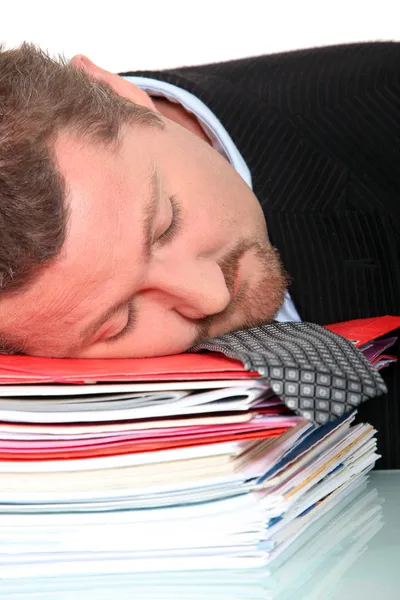 Businessman asleep on his files — Stok fotoğraf