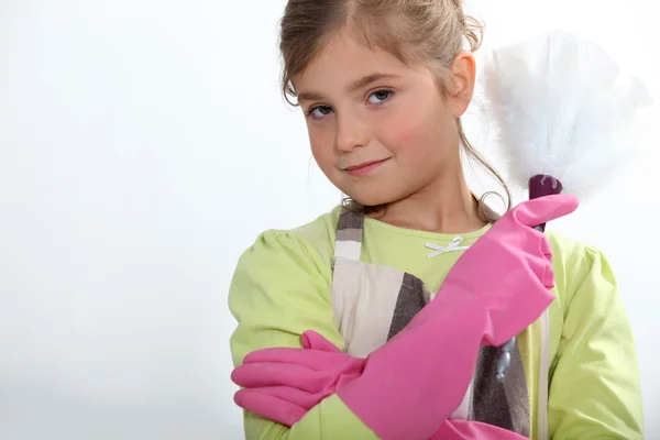 Little girl dusting — Stock Photo, Image