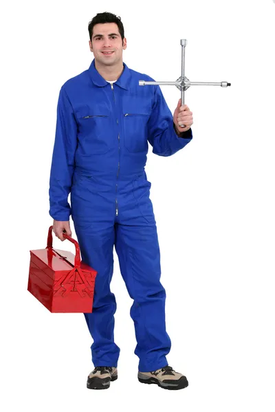 Mechanic met tool kit — Stockfoto
