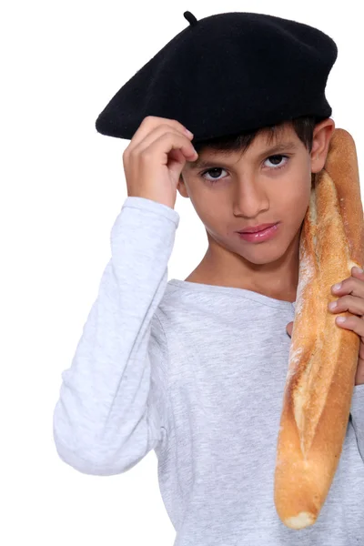 Jongen met sneetje brood — Stockfoto