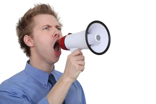 Man yelling into a megaphone — Stock Photo, Image