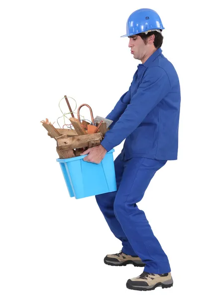 Constructor que lleva la caja de residuos — Foto de Stock