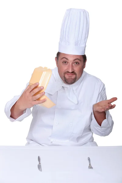 Chef confused by fast-food packaging — Stock Photo, Image