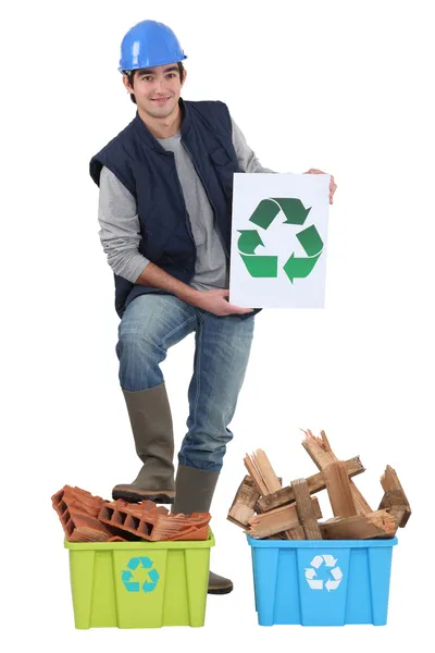 Builder recycling old material — Stock Photo, Image