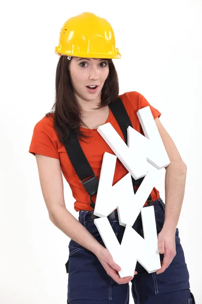 Female builder holding large WWW letters — Stock Photo, Image