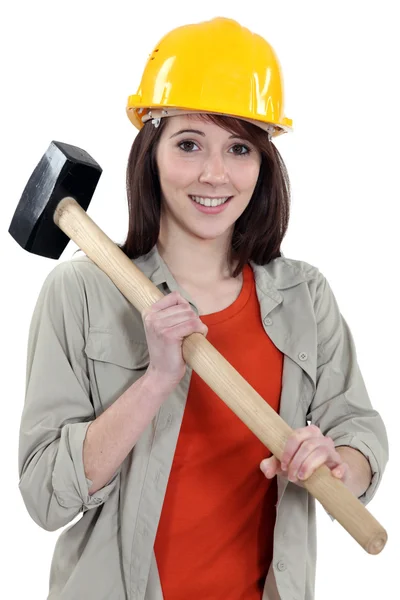 Female labouror holding sledge hammer — Stock Photo, Image