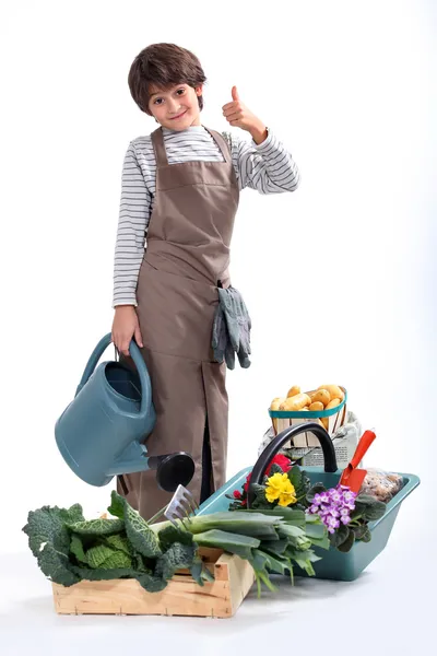 Un petit garçon habillé en jardinier — Photo
