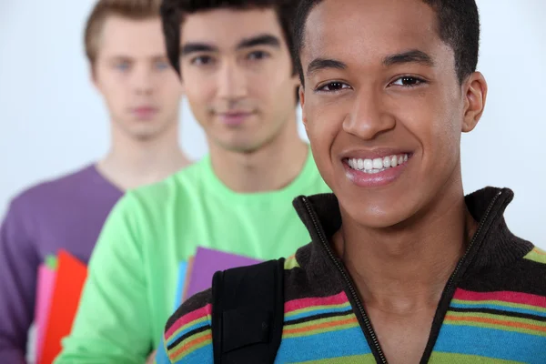 Three male student in line. — Stock Photo, Image