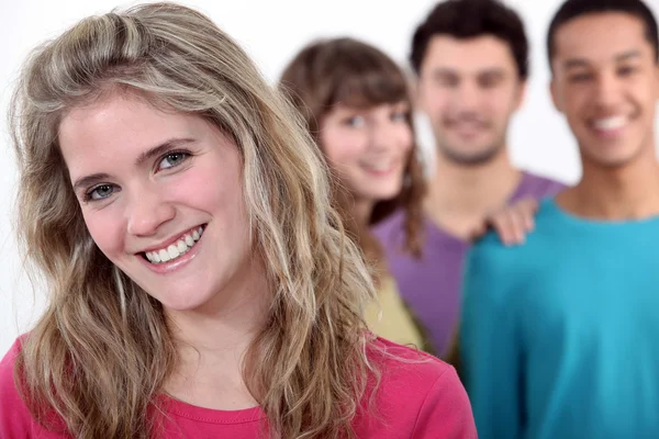 Happy woman with a group of friends — Stock Photo, Image