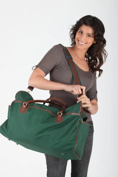 Krásná žena s taškou — Stock fotografie