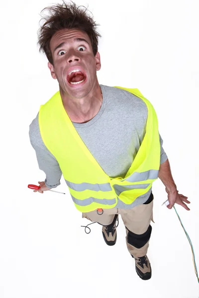 Muž trpící elektrickým proudem — Stock fotografie