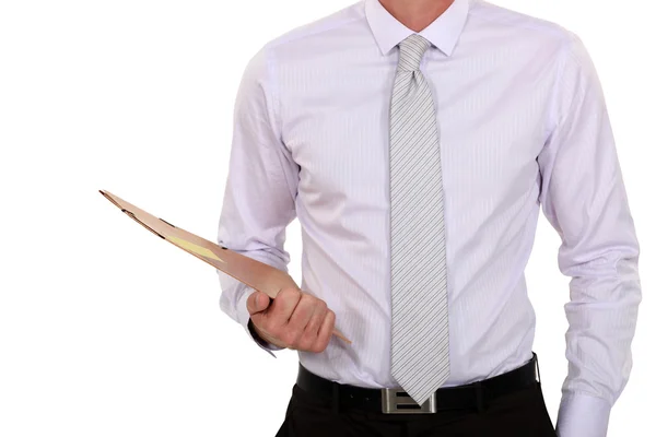 Businessman holding a clipboard — Stock Photo, Image