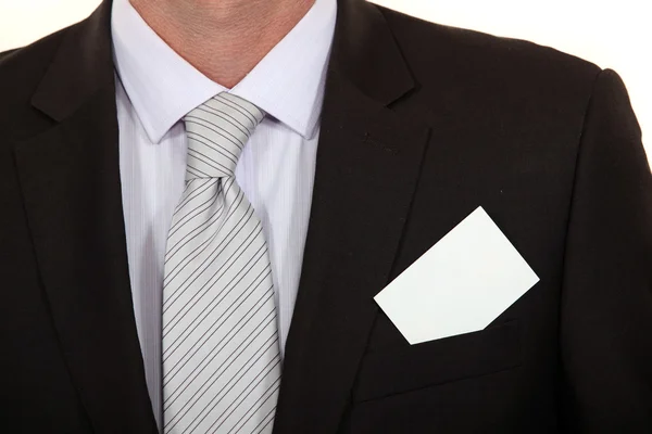 Närbild på visitkort på affärsmannens kostym — Stockfoto