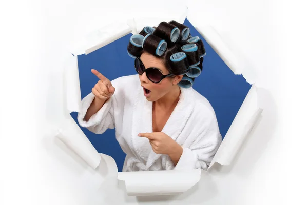 Brunette wearing hair-rollers and sunglasses — Stock Photo, Image