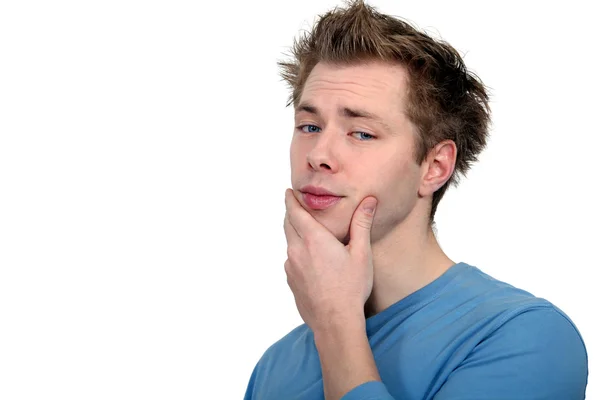 Man with his hand on his chin — Stock Photo, Image