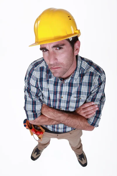 Um trabalhador da construção duvidoso . — Fotografia de Stock
