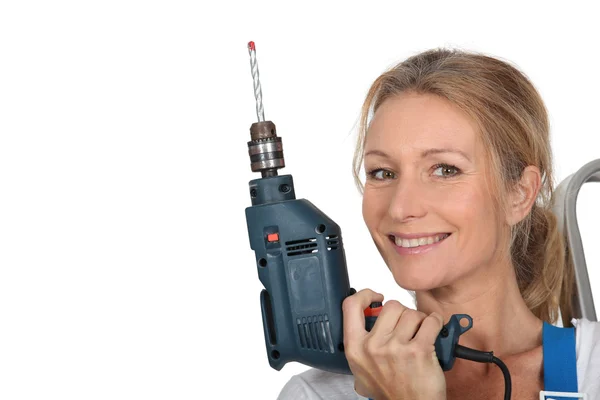 Woman holding electric drill — Stock Photo, Image