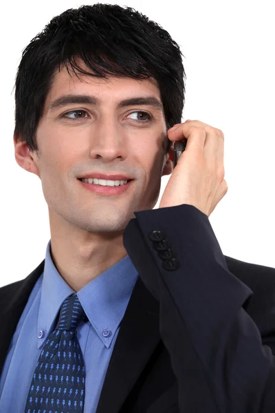 使用移动电话的年轻成功商人 — 图库照片