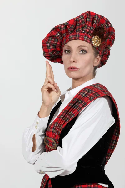 Femme en costume écossais — Photo