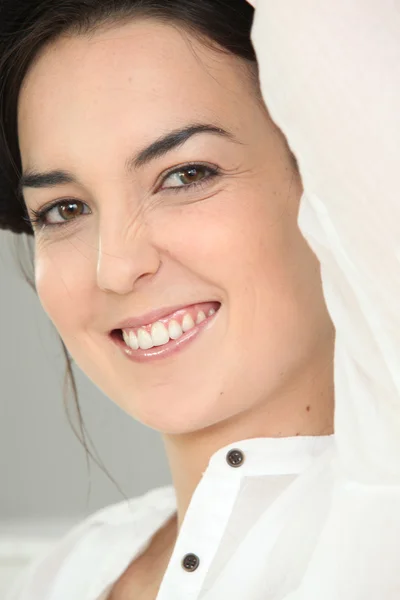 Close-up van een glimlachende vrouw — Stockfoto