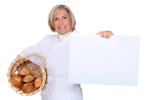 Bageri arbetaren själv reklam — Stockfoto