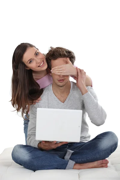 Girl surprising her boyfriend Stock Photo