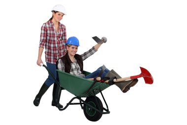 Duo of female bricklayers clipart