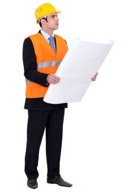 Engineer verifying a drawing clipart