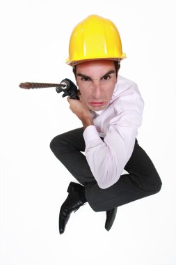 Angry man holding power drill clipart