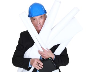 Pouting engineer carrying a stack of rolled-up drawings clipart