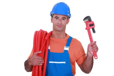 Plumber has found the right tool clipart