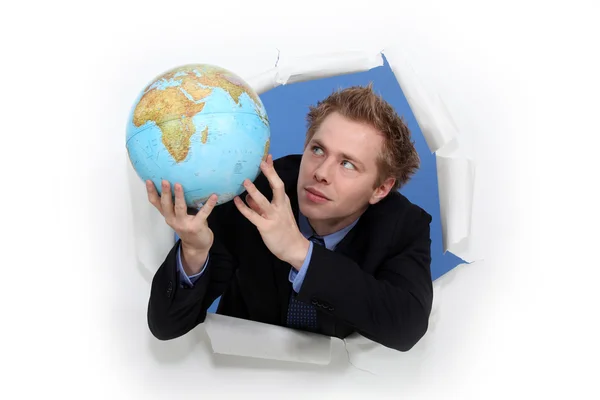 Mann mit Globus — Stockfoto